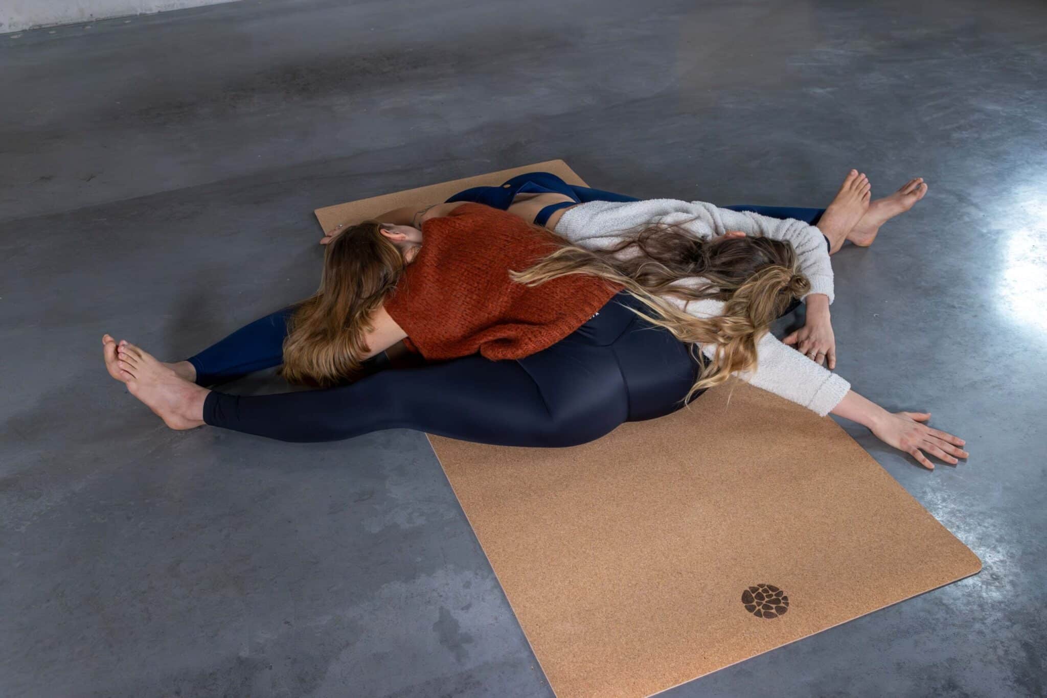 Two Women Stretching On PIERRE Cork Mat