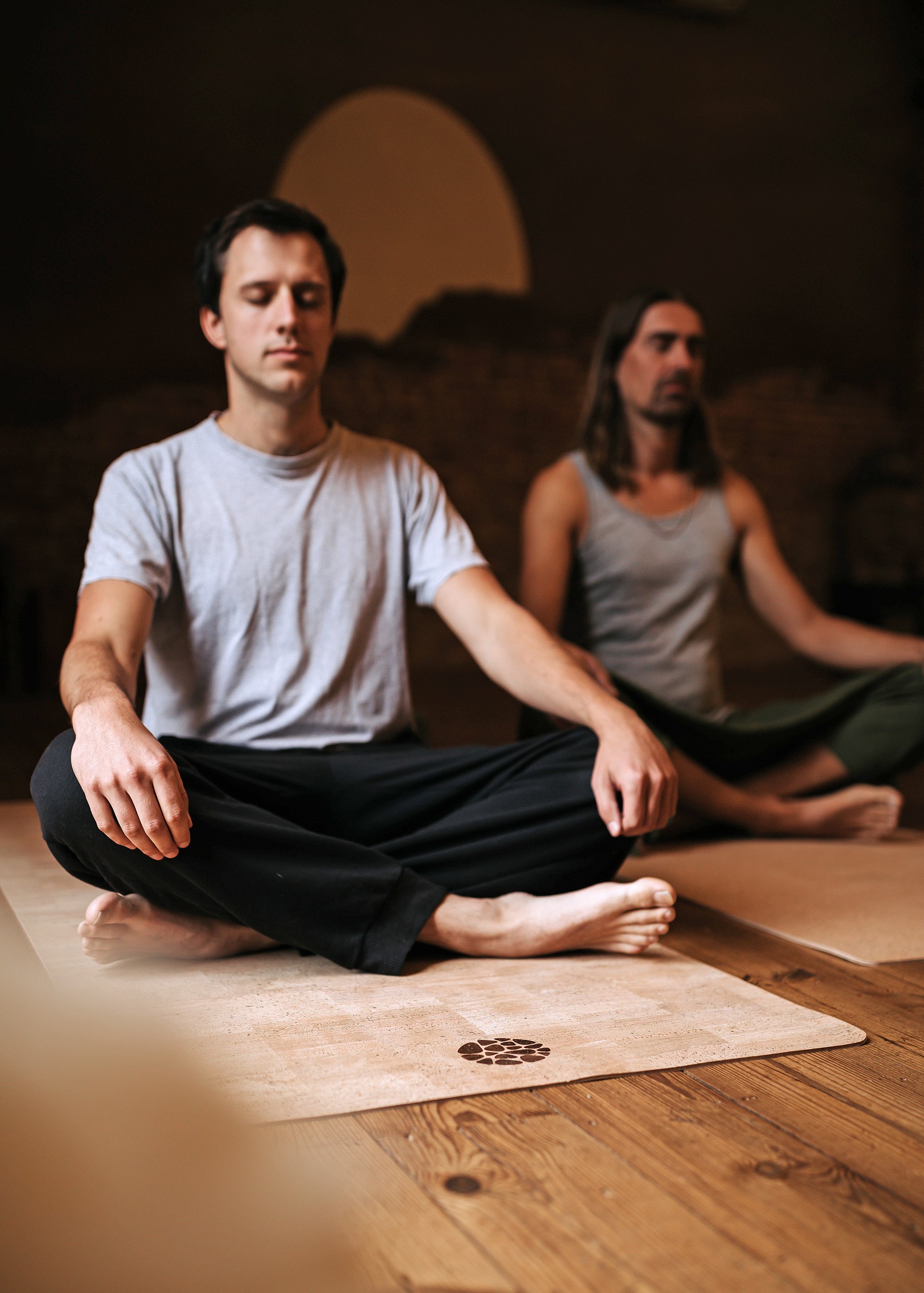 Two Men Meditating On PIERRE Cork Mats