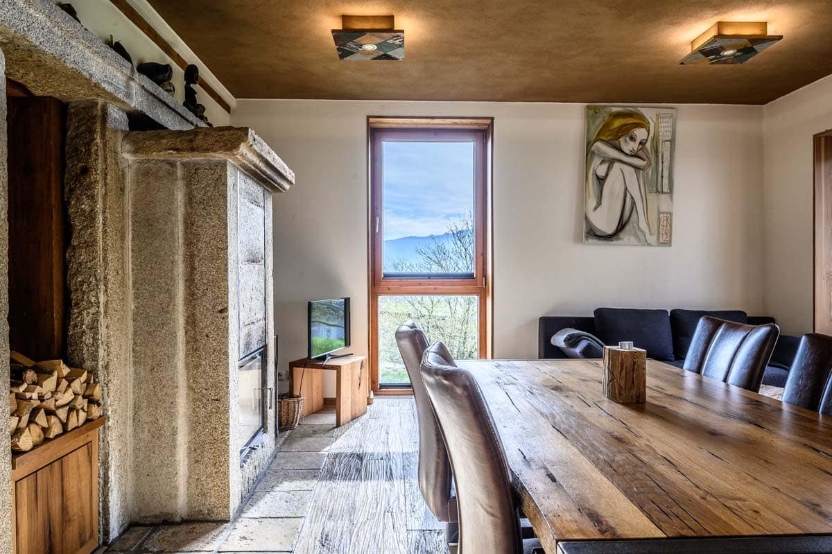 Rustic Wood Dining Area With Fireplace