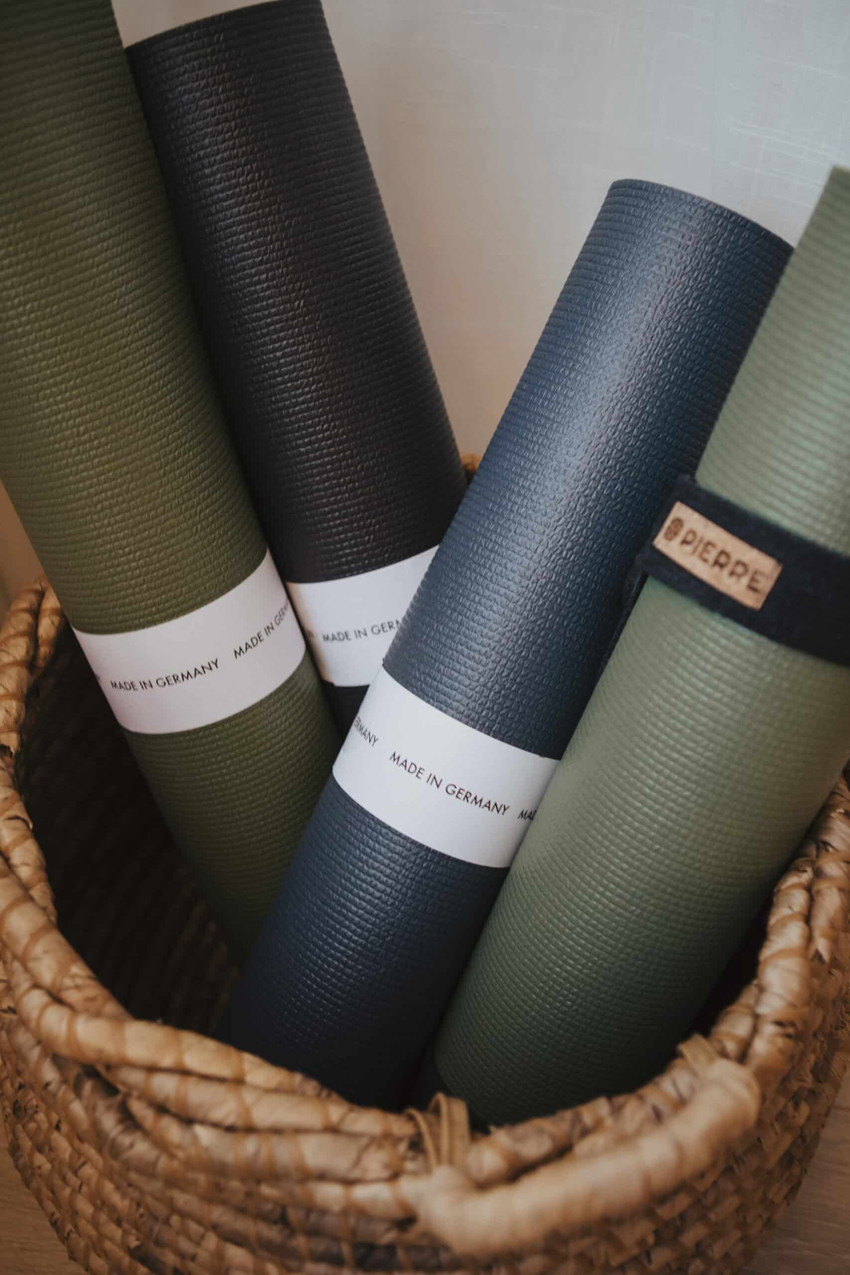 PIERRE Rolled Yoga Mats in Woven Basket