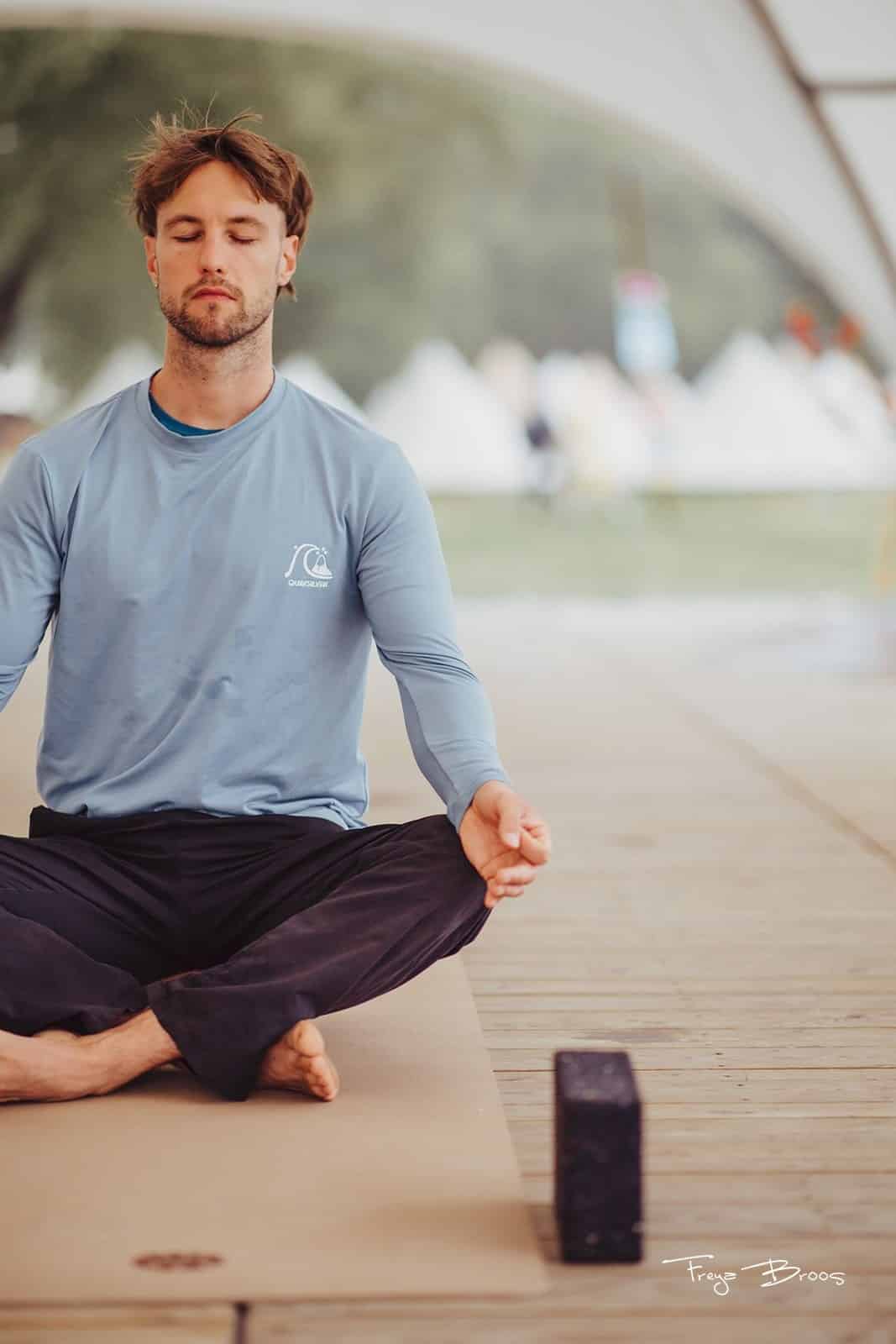Man Meditating on PIERRE Yoga Mat
