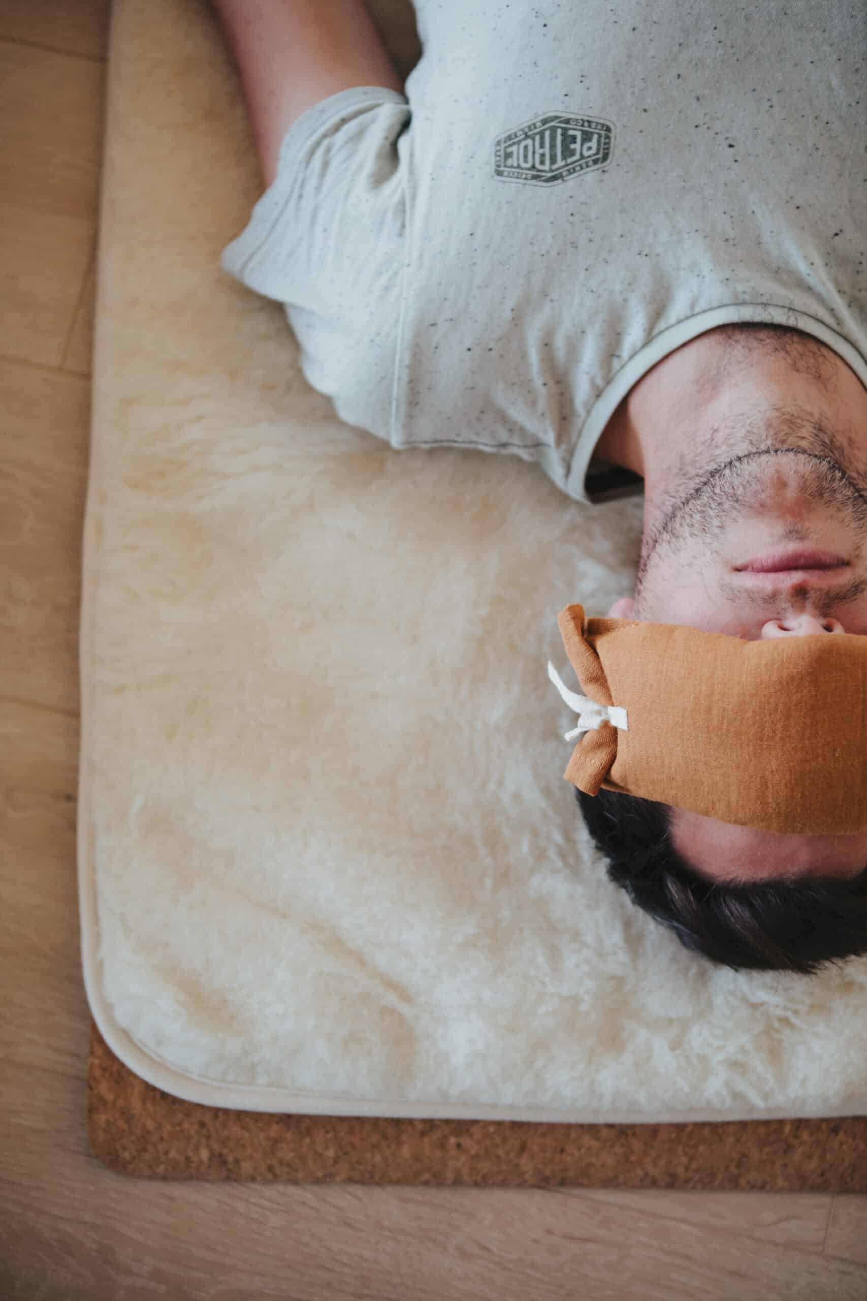 Man Relaxing On PIERRE Yoga Mat