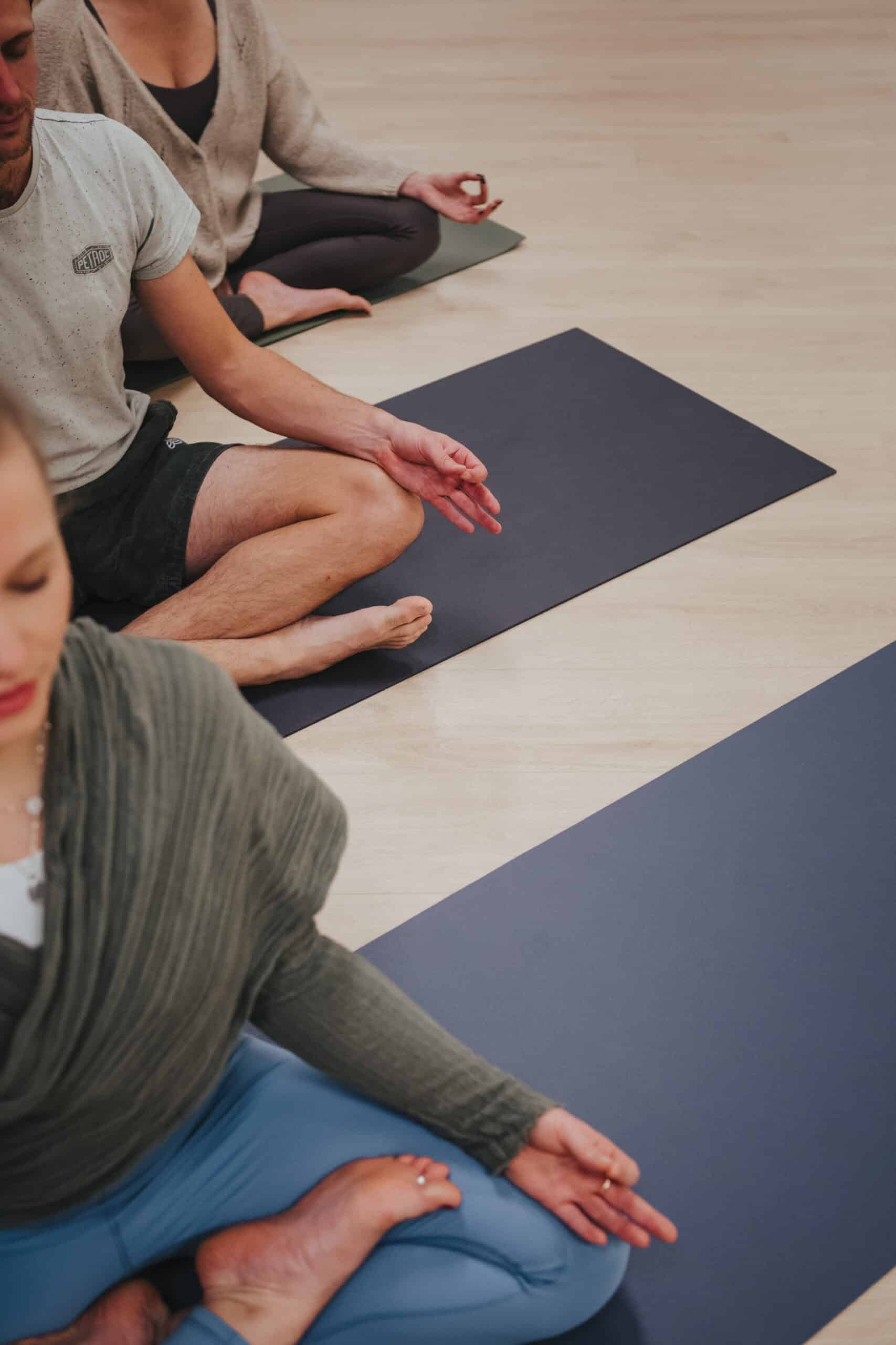 Group Yoga Class In Meditative Lotus Pose