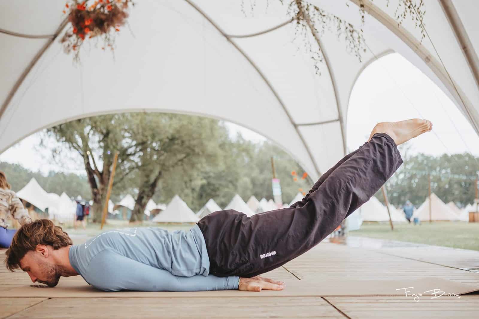 Man In Locust Pose On PIERRE Mat
