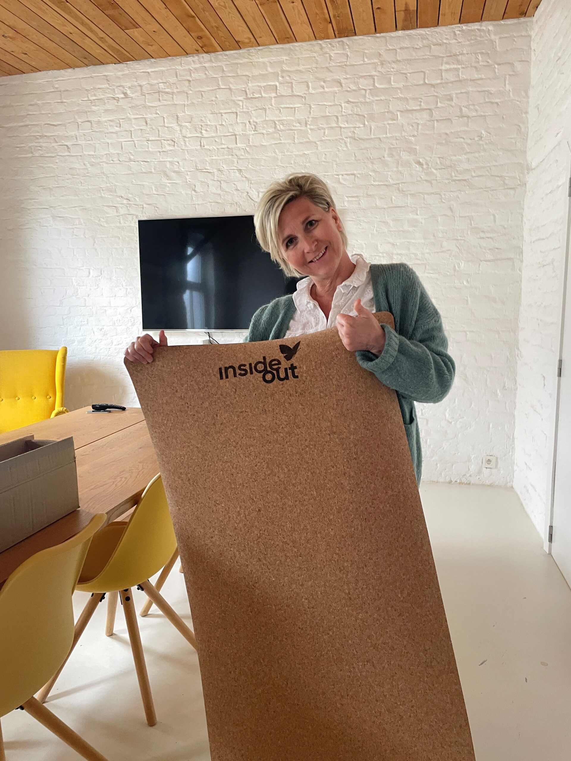 Woman Holding Custom Cork Yoga Mat