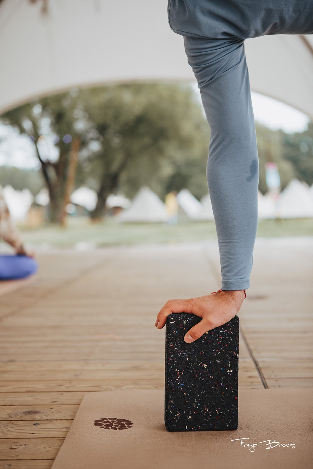 Festival Dome Hand On Block Standing