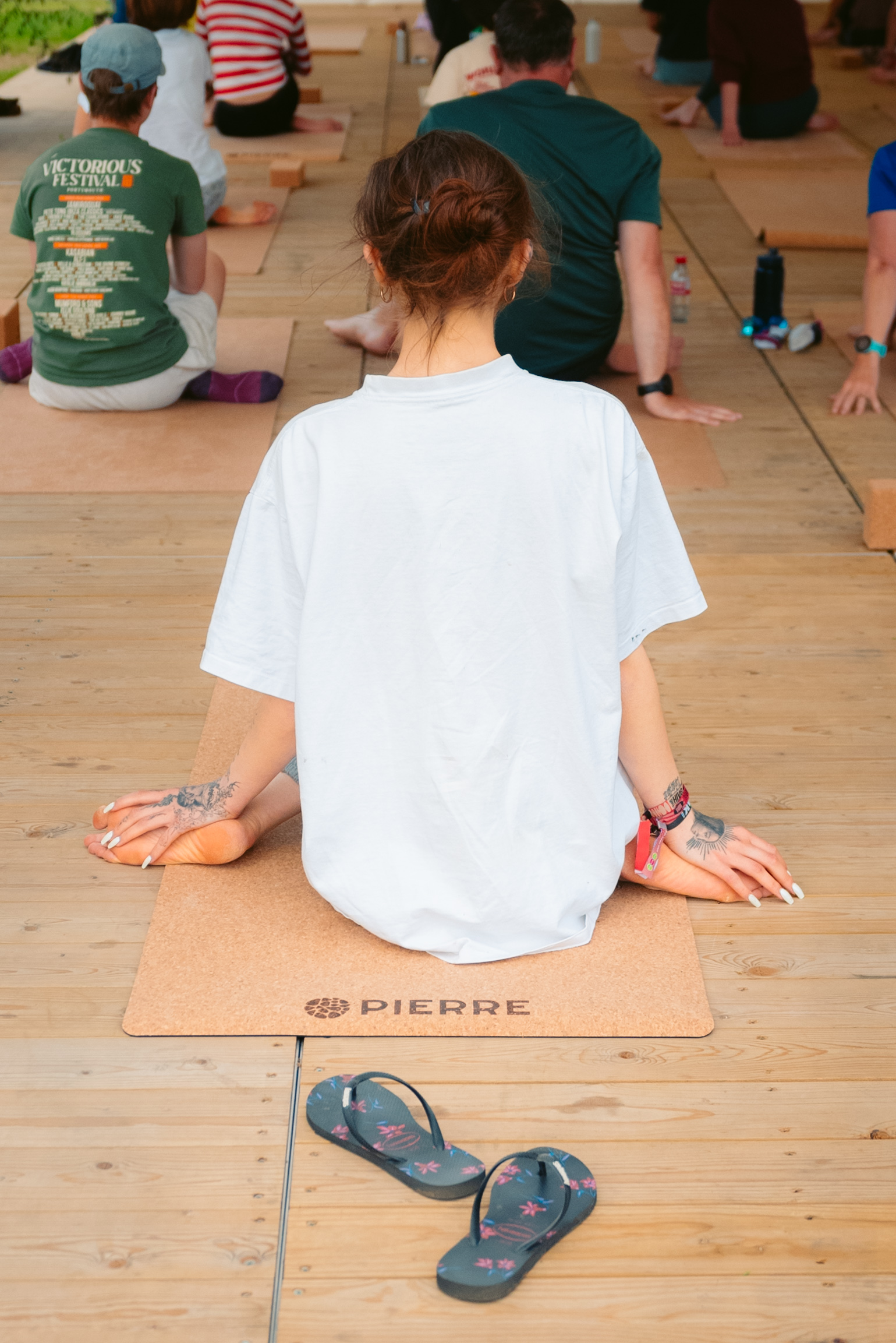 Rock Werchter Woman Seated Back View Mat