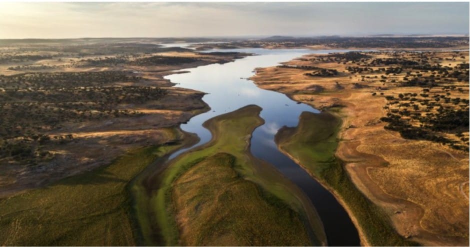 Aerial View Of River And Arid Landscape