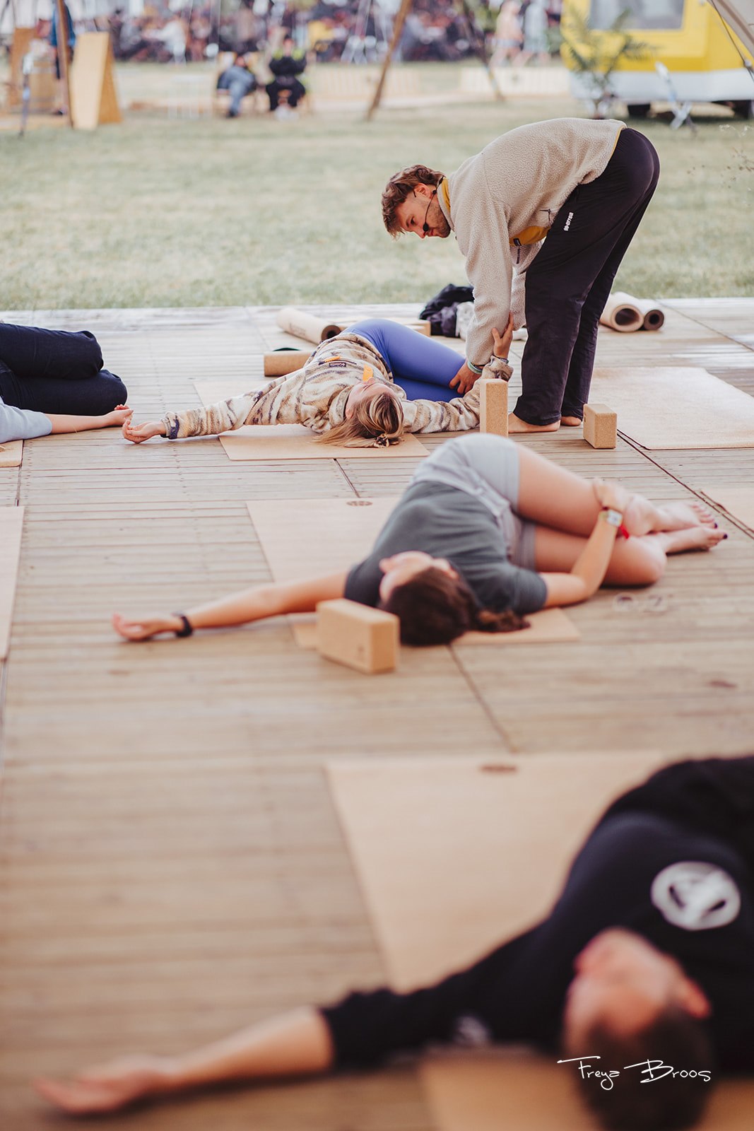 Festival Dome Teacher Assisting Savasana