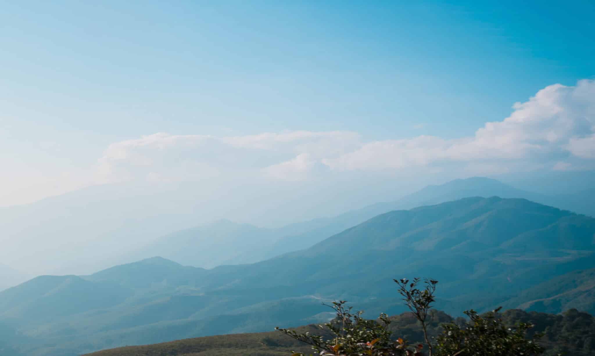 Misty Blue Mountain Range Under Clear Sky