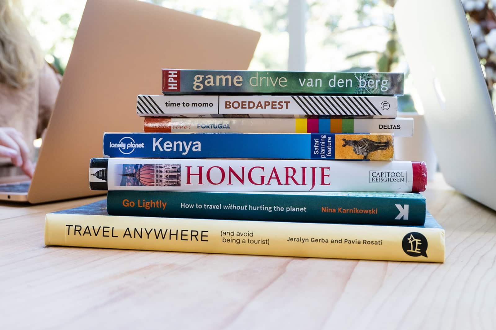 Stack Of Travel And Sustainable Living Books