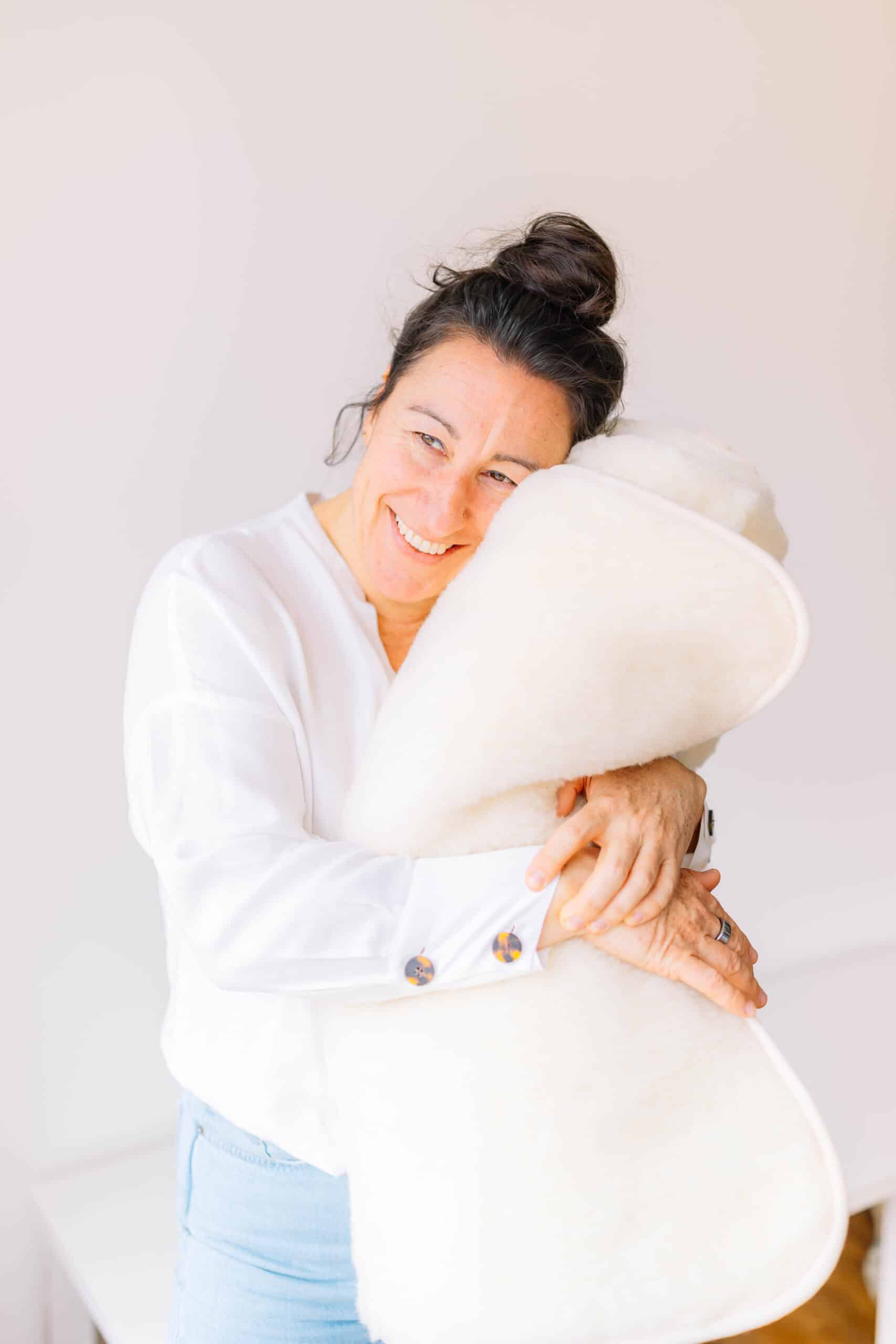 Woman Holding PIERRE Wool Yoga Mat