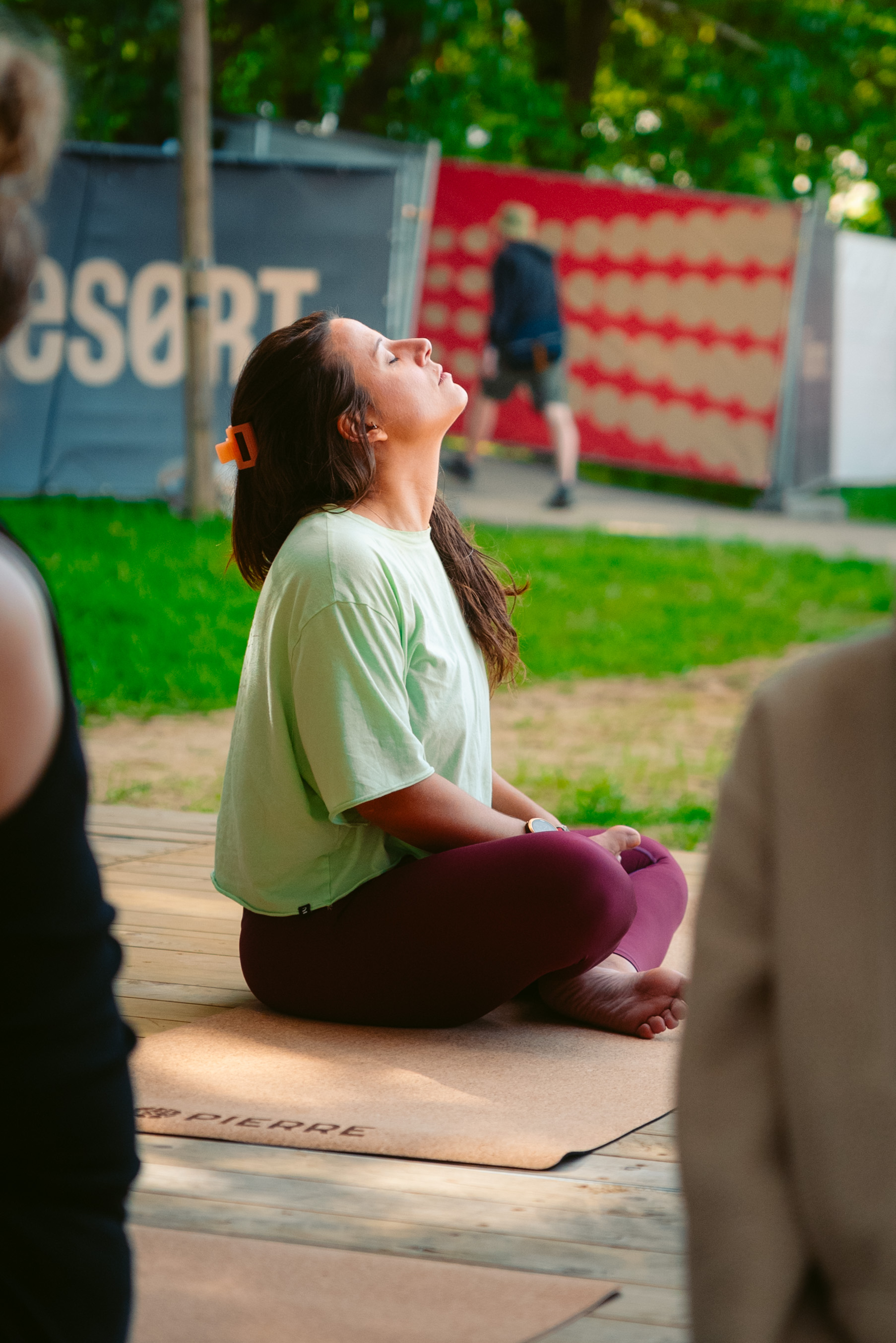 Rock Werchter Woman Seated Green Tee Grass