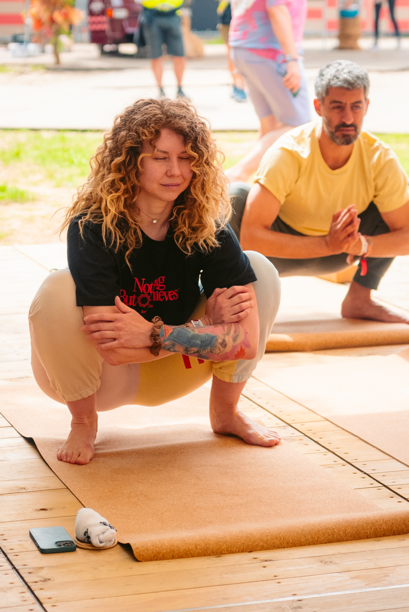 Rock Werchter Squat Prayer Pose Pair